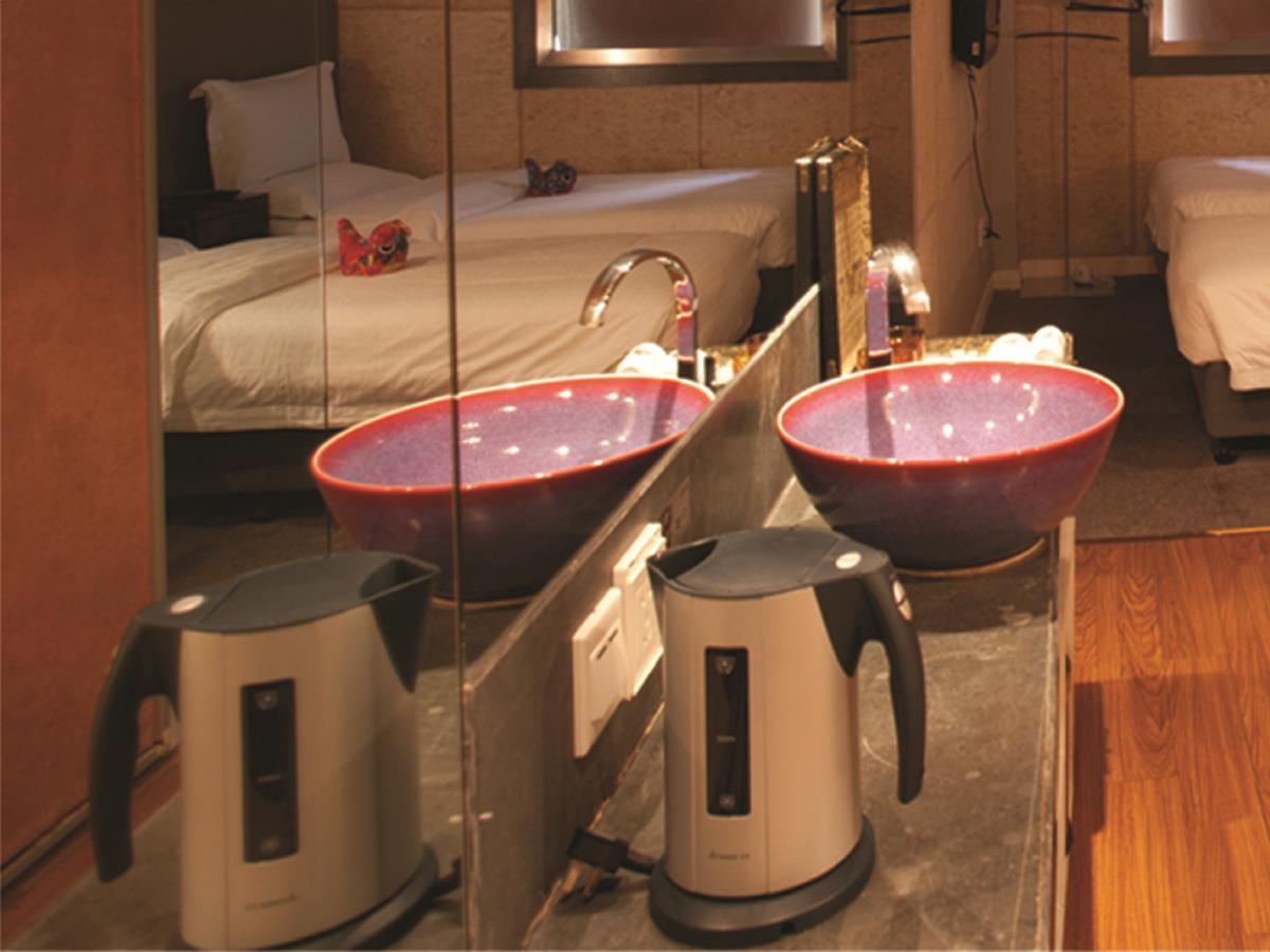 China Community Art Habitat Hotel Qingdao Quarto foto